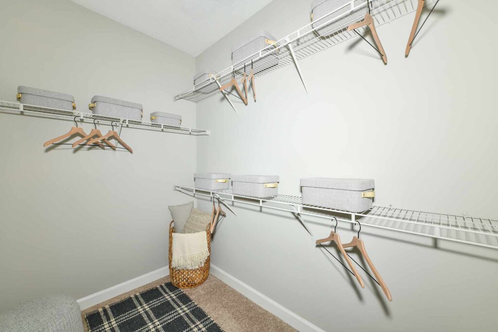 Walk in closet with built in shelves