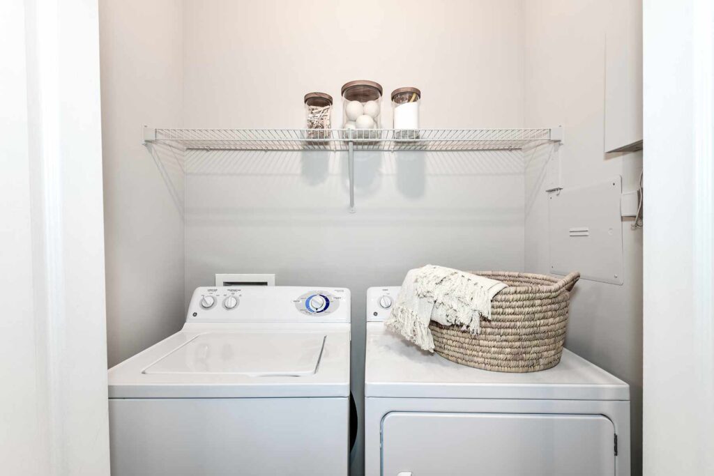 Laundry closet with washer and dryer