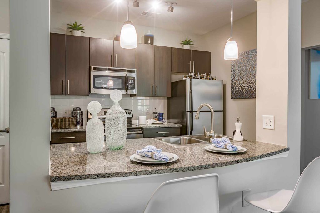 Kitchen breakfast bar seating with granite countertops